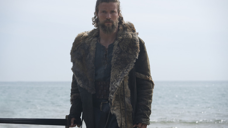 Harald stands with sword drawn