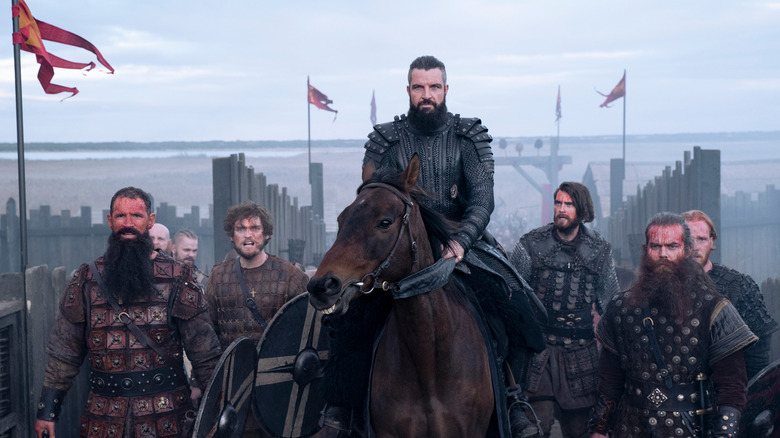 King Canute on horseback going into battle