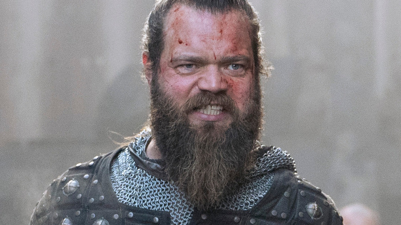 Jóhannes Haukur Jóhannesson as a grimacing Olaf in Vikings: Valhalla