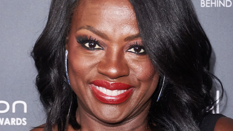 Viola Davis smiling with red lipstick