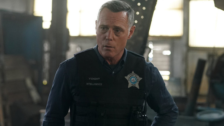 Hank Voight in messy warehouse