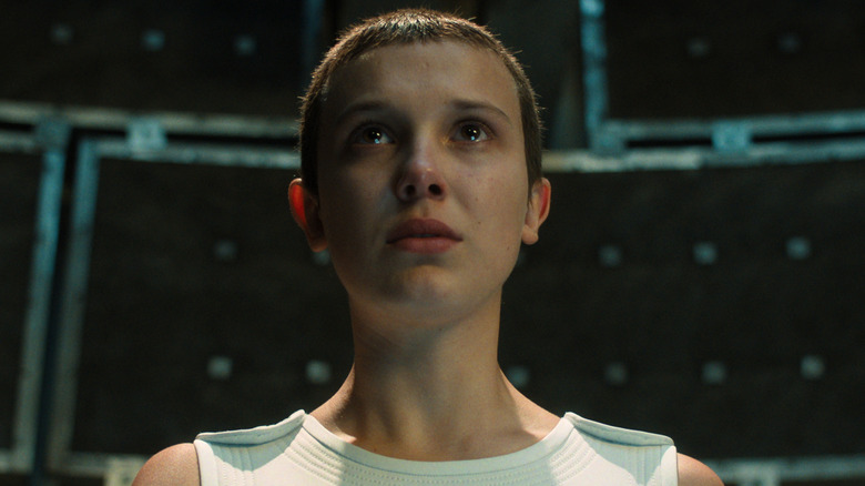 A teary-eyed Eleven in Hawkins Lab in "Stranger Things" (2016-2025)