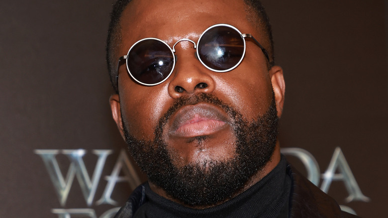 Winston Duke wearing sunglasses