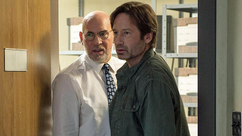 Walter and Mulder in doorway