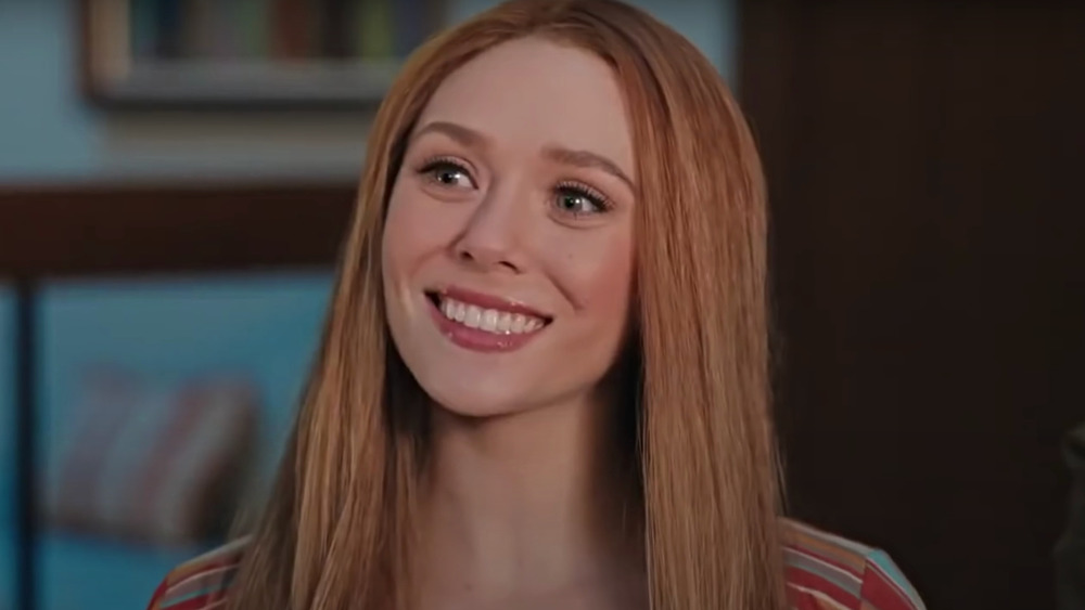 Wanda with straight hair, smiling