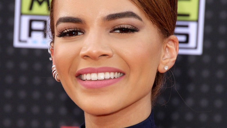 Leslie Grace smiles for the cameras