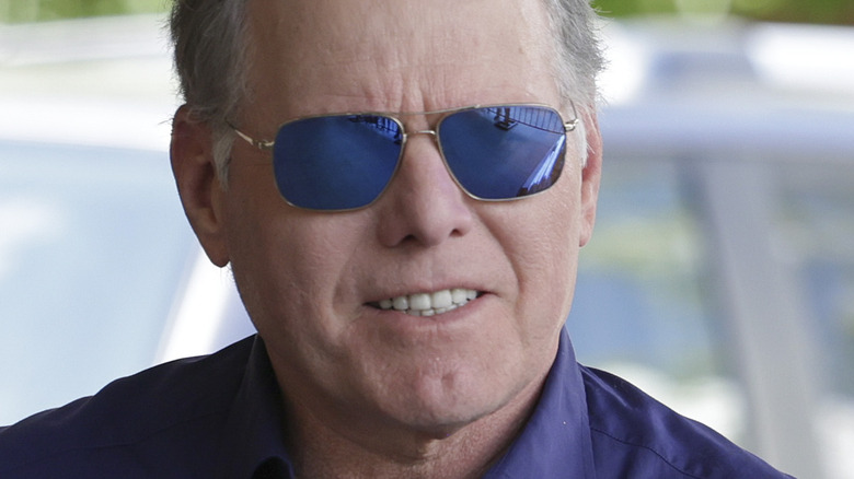 David Zaslav grinning with glasses