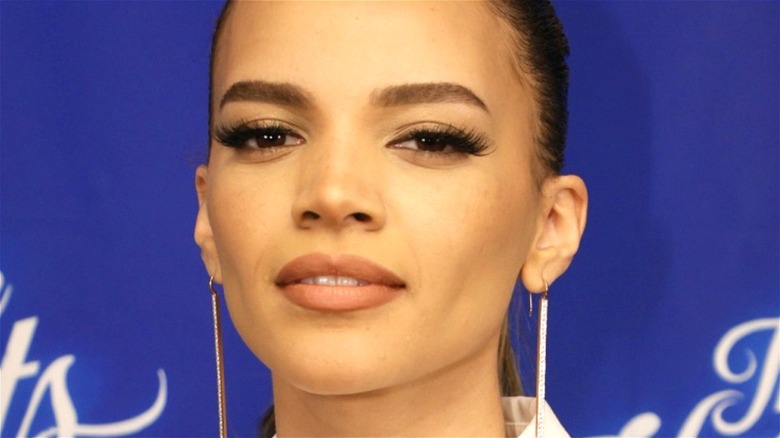 Leslie Grace posing for red-carpet pictures