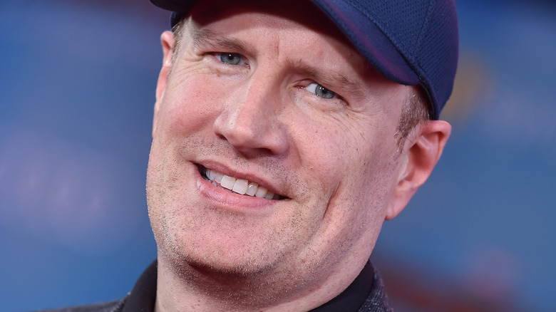 Kevin Feige wearing blue baseball cap