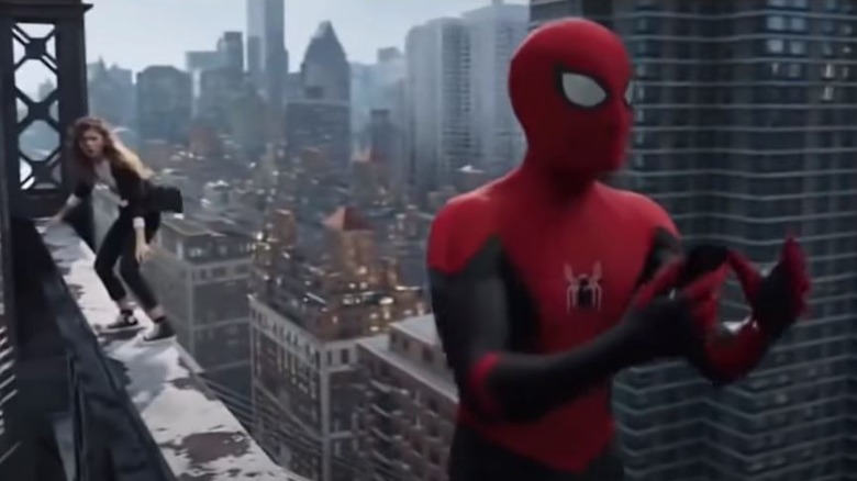 MJ and Spider-Man atop a bridge