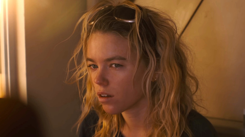 Kara Zor-El wearing sunglasses on her head in Supergirl