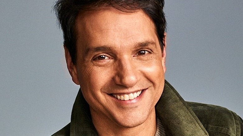 Ralph Macchio smiling for headshot