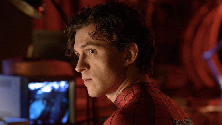 Peter Parker with his mask off working on spider gear in Punisher's hideout in Spider-Man: Brand New Day (2026)
