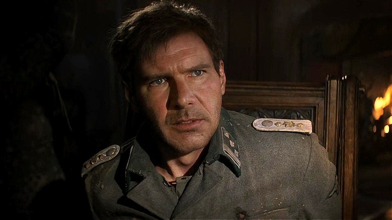 De-aged Indiana Jones looking upset in Dial of Destiny