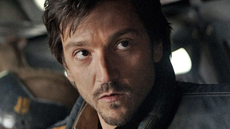 Cassian Andor sitting in a ship
