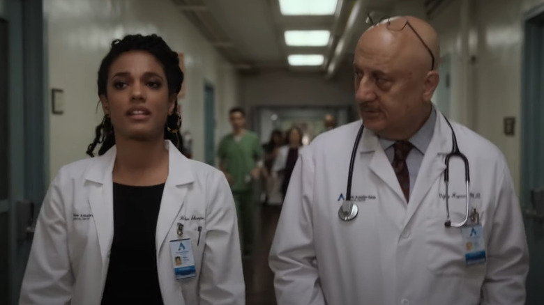 Dr. Helen Sharpe walking and talking with another doctor