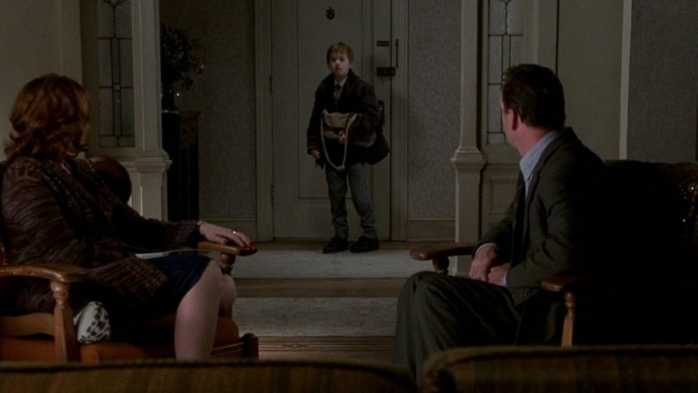 Haley Joel Osment, Toni Collette, and Bruce Willis in The Sixth Sense