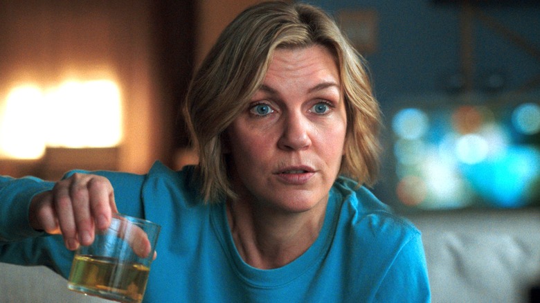 Carol holding up yellow liquid on Pluribus