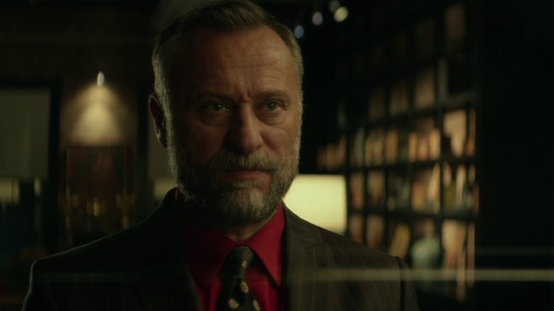 Viggo stands in the penthouse in "John Wick" (2014)