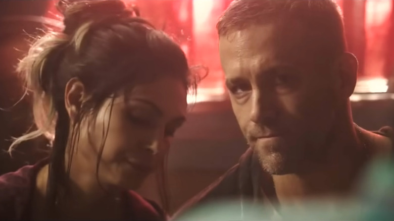 Vanessa and Wade frowning