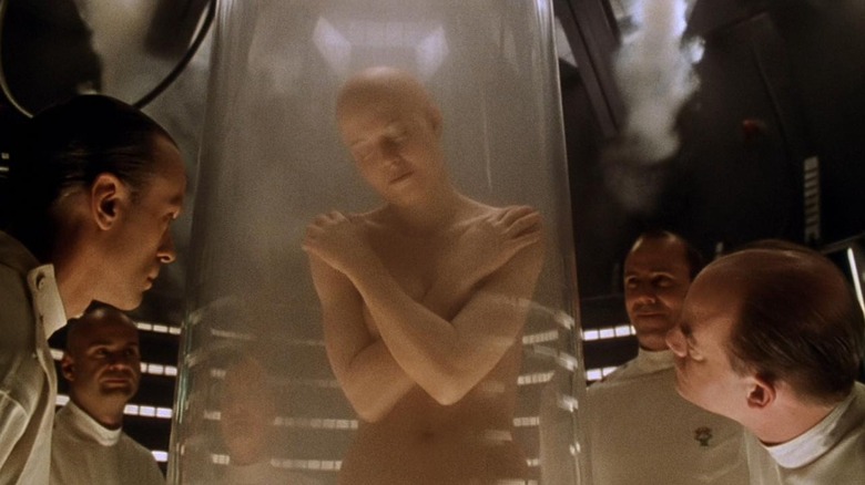 Scientists look at clone Ripley in "Alien: Resurrection" (1997)