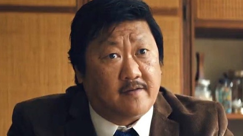 Marcus sits at his desk in "Weapons" (2025)
