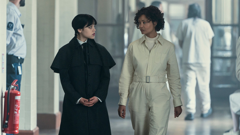Wednesday walking with a doctor in "Wednesday."