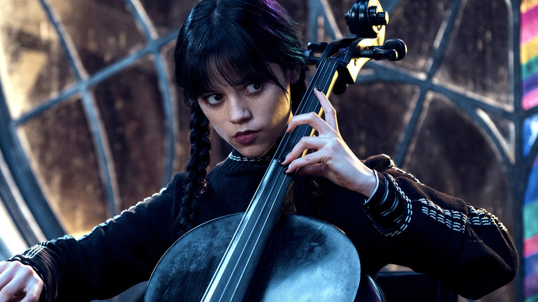 Wednesday Addams plays a cello