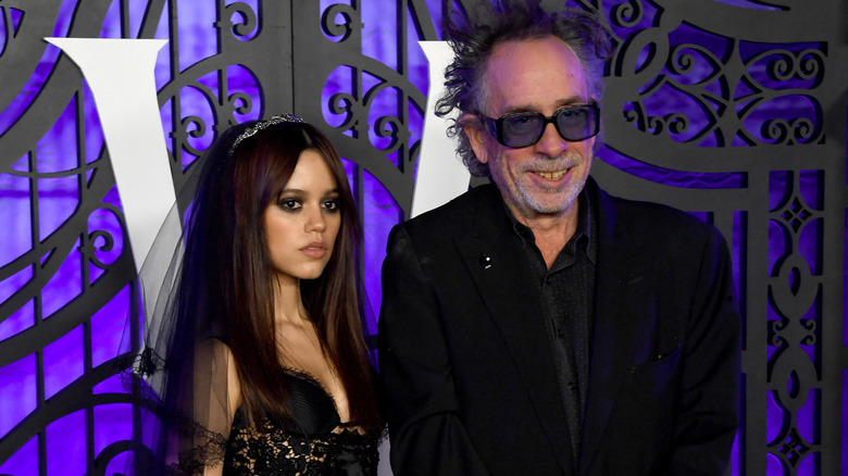 Jenna Ortega and Tim Burton posing for a photo