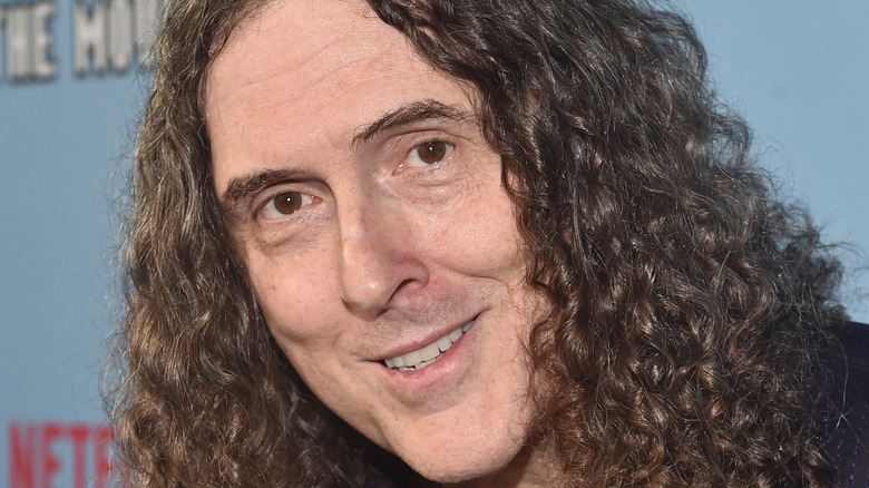 Weird Al smiling at camera