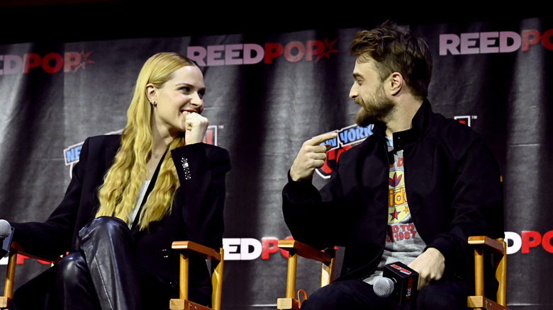Evan Rachel Wood and Daniel Radcliffe talking on stage at NYCC