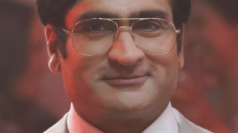 Steve Banerjee smiling in glasses