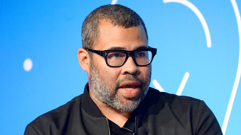 Jordan Peele speaking at a panel