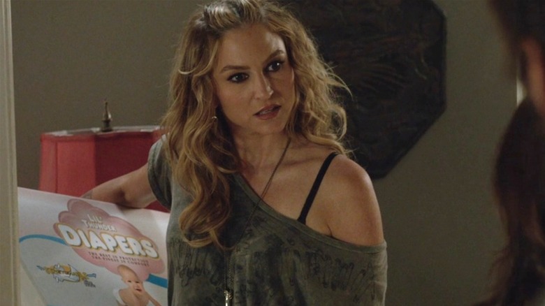 Drea de Matteo holding diapers