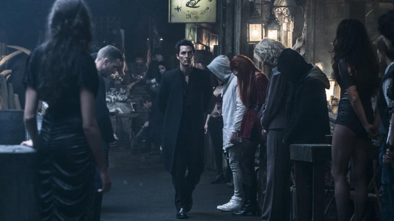 Walter walking through dark street (2017)