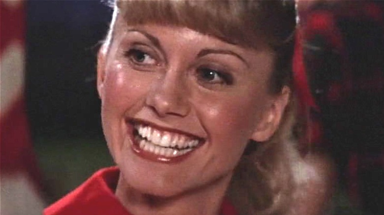 Sandy smiling in Grease