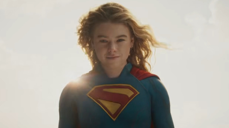 Supergirl smiling against a bright sun in 