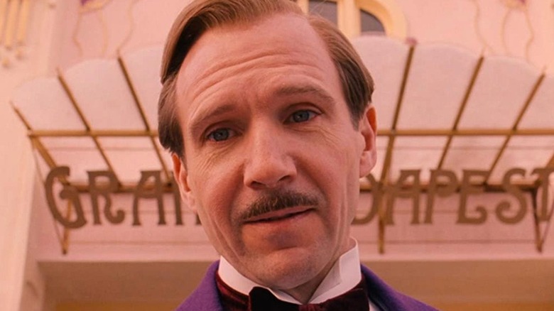 Ralph Fiennes welcoming new guests