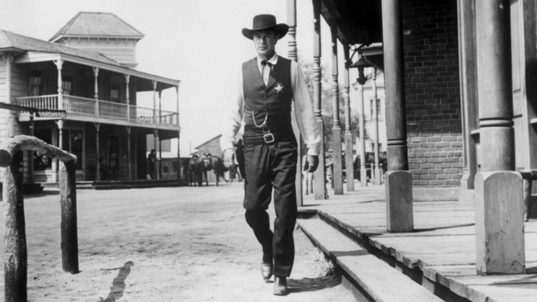 Marshal Will Kane walking down the road in "High Noon"