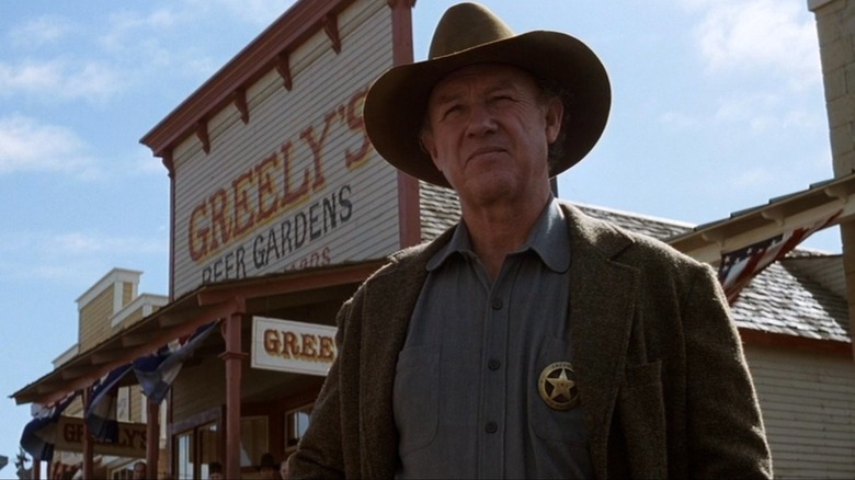 Sheriff "Little Bill" Daggett standing in the road in "Unforgiven"