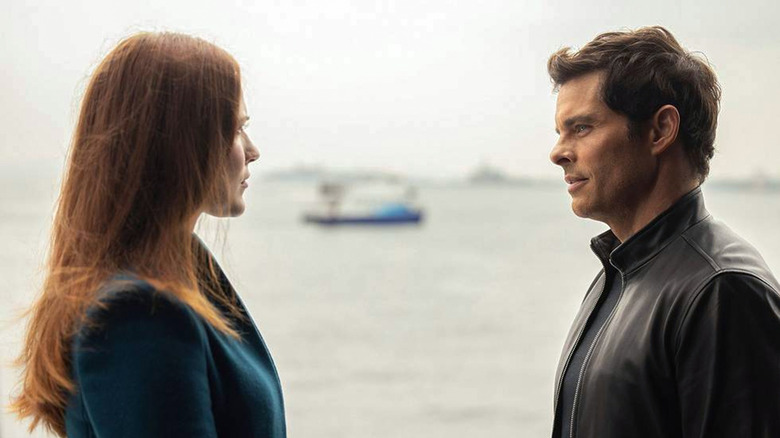 Christina and Teddy talking at waterfront
