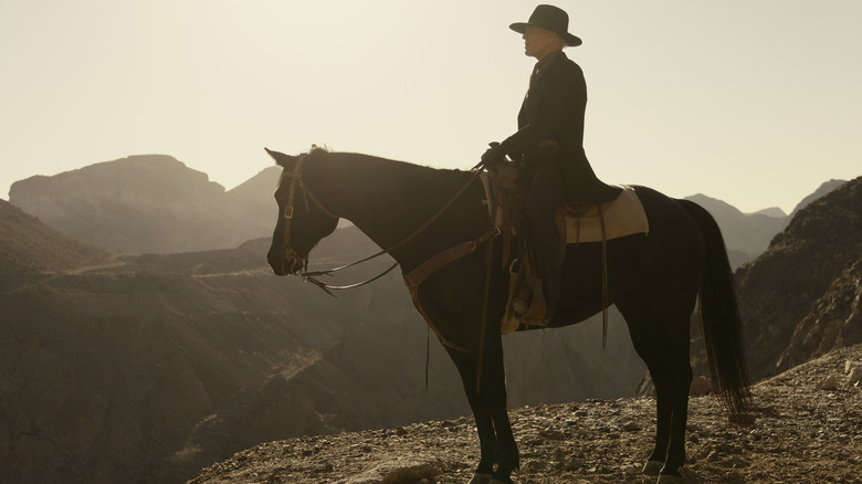 Man in Black on horse