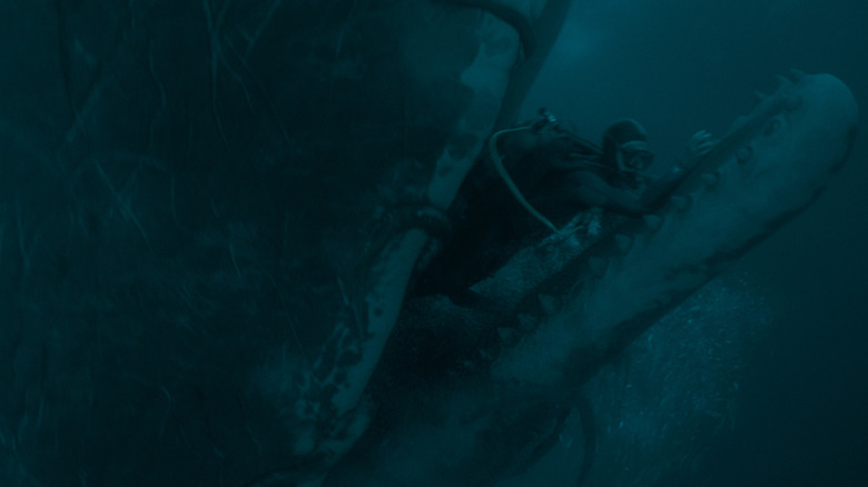 Jay trying to get out of whale's mouth in Whalefall
