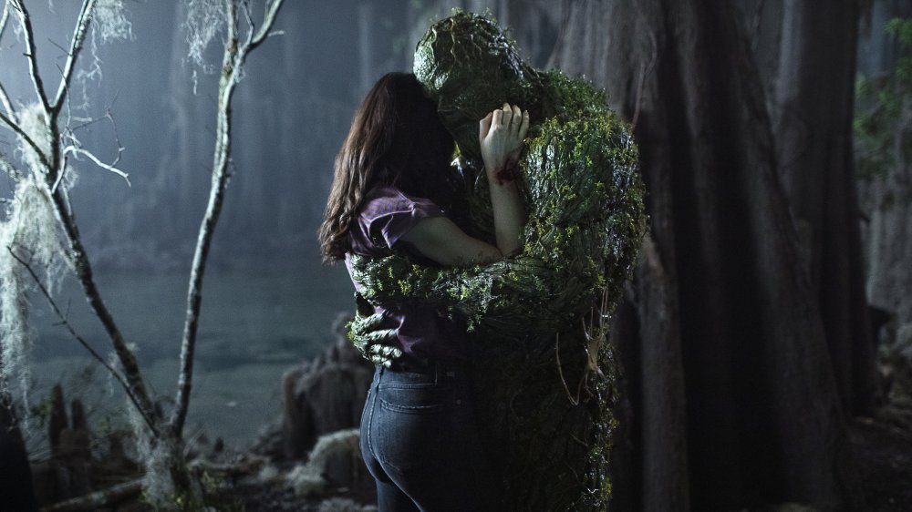 Crystal Reed and Derek Mears in Swamp Thing