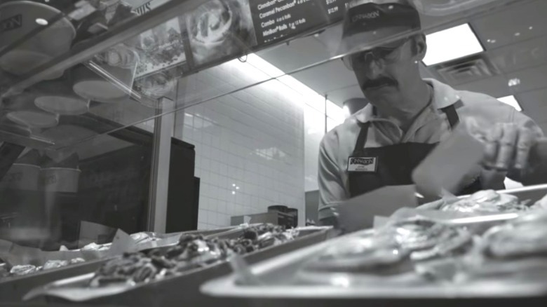 Bob Odenkirk getting the Cinnabon rolls ready