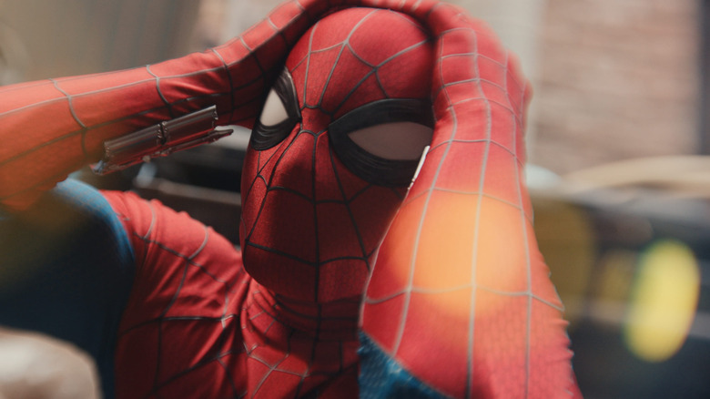Spider-Man holding his head in Spider-Man: Brand New Day