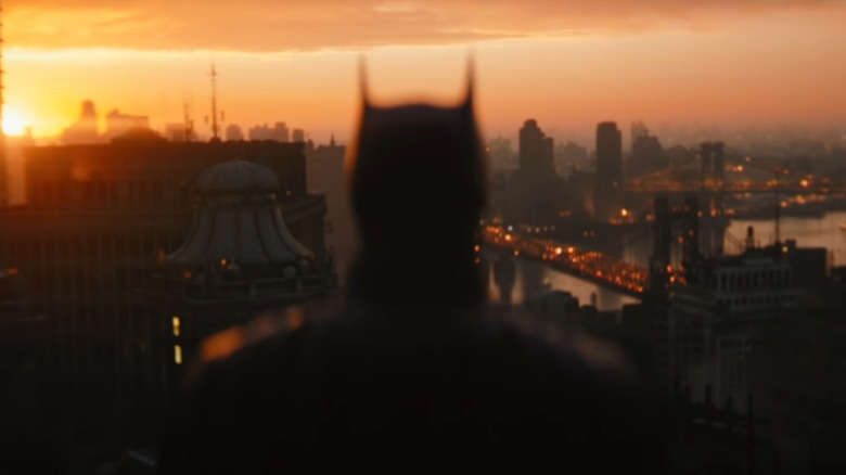 Batman looks out over Gotham