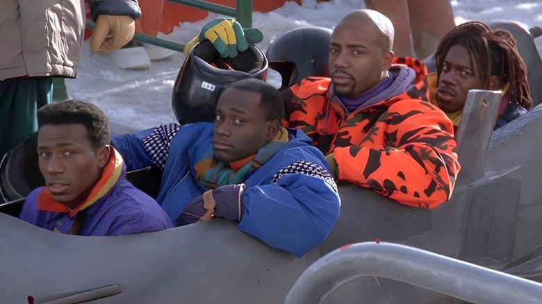 Derice, Junior, Yul, and Sanka in a bobsled