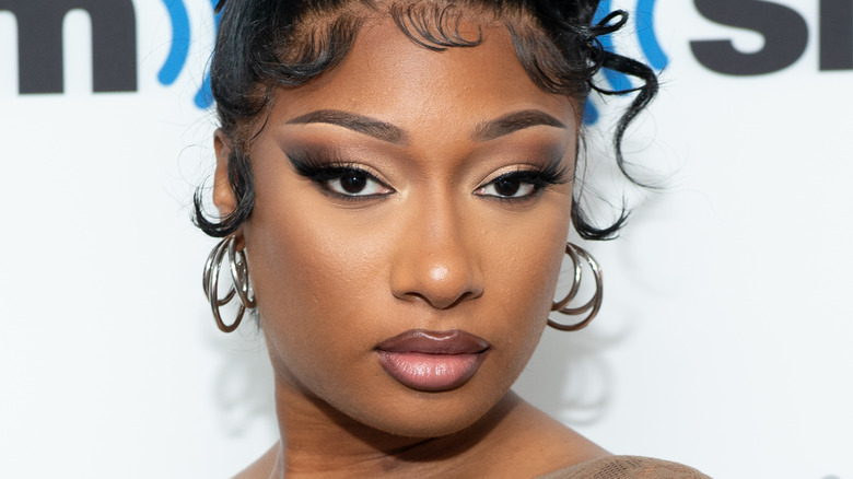 Megan Thee Stallion wearing hoop earrings