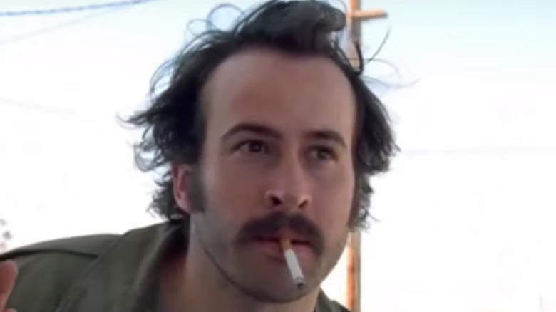 Jason Lee smoking cigarette